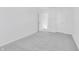 Neutral bedroom with gray carpet and a doorway leading to another room at 1095 Bevy Blvd, Danville, IN 46122