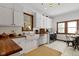 Kitchen with white cabinets, butcher block countertops, and stainless steel appliances at 26735 Six Points Rd, Sheridan, IN 46069