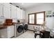 Convenient laundry area with washer, dryer, and additional counter space at 26735 Six Points Rd, Sheridan, IN 46069