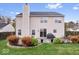 Home with a large backyard, featuring mature landscaping and a cozy patio area at 10034 Evening Sun Ct, Avon, IN 46123