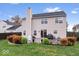 Home with a large backyard, featuring mature landscaping and a cozy patio area at 10034 Evening Sun Ct, Avon, IN 46123