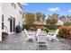 Backyard patio area with a stone patio, outdoor furniture, and a grill, ideal for entertaining at 10034 Evening Sun Ct, Avon, IN 46123