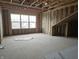 Spacious unfinished bedroom with large window and ample natural light at 2331 Saddle Dr, Shelbyville, IN 46176