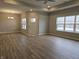 Bright living room with hardwood floors, recessed lighting, and neutral walls at 2331 Saddle Dr, Shelbyville, IN 46176