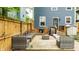Backyard patio with outdoor seating and grill, ideal for outdoor dining and gatherings at 3047 N New Jersey St, Indianapolis, IN 46205