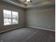 Bright bedroom featuring carpeted floor and a window at 2327 Saddle Dr, Shelbyville, IN 46176