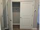 Double door closet with hanging rod and shelf at 2327 Saddle Dr, Shelbyville, IN 46176