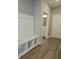 Laundry room with built-in bench and shelving at 2327 Saddle Dr, Shelbyville, IN 46176