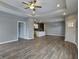 Open living room with hardwood floors and high ceilings at 2327 Saddle Dr, Shelbyville, IN 46176