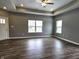 Living room with hardwood floors and multiple windows at 2327 Saddle Dr, Shelbyville, IN 46176
