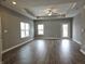 Spacious living room featuring hardwood floors and ceiling fan at 2327 Saddle Dr, Shelbyville, IN 46176