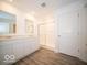 Bathroom boasts double vanity, a large shower, and modern flooring at 6112 Card Blvd, Indianapolis, IN 46221