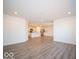 Bright and airy living room with vinyl flooring and an open floor plan at 6112 Card Blvd, Indianapolis, IN 46221