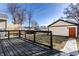 Inviting backyard deck featuring sleek, dark wood and backyard views at 1015 Churchman Ave, Indianapolis, IN 46203