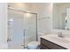 Modern bathroom features a shower with sliding glass doors and a contemporary vanity at 1105 Gatewick Ct, Greenwood, IN 46143