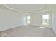 Spacious bedroom with plush carpet, recessed lighting, and natural light at 1105 Gatewick Ct, Greenwood, IN 46143