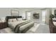 Serene bedroom with plush bedding, ample natural light, and stylish decor at 1105 Gatewick Ct, Greenwood, IN 46143