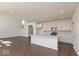 Modern kitchen with a center island, stainless steel appliances, and recessed lighting at 1105 Gatewick Ct, Greenwood, IN 46143