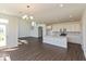 Spacious living area with an open floor plan and staircase leading to the second floor at 1105 Gatewick Ct, Greenwood, IN 46143