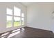 Bright, open living room with floor-to-ceiling windows and plenty of natural light at 1105 Gatewick Ct, Greenwood, IN 46143