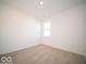 Bright bedroom with neutral carpeting and a window at 2262 Pine Valley Dr, Plainfield, IN 46168