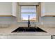 Sleek kitchen sink and faucet with granite countertop at 2810 E Banta Rd, Indianapolis, IN 46227