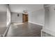 Spacious living room with gray walls and laminate floors at 2810 E Banta Rd, Indianapolis, IN 46227