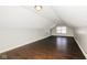Attic space with hardwood flooring, natural light and fresh paint at 5060 Staughton Dr, Indianapolis, IN 46226