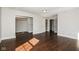 Bright bedroom with a closet, shelving, fresh paint and hardwood flooring at 5060 Staughton Dr, Indianapolis, IN 46226