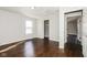 Bedroom featuring natural light, fresh paint, and hardwood flooring at 5060 Staughton Dr, Indianapolis, IN 46226