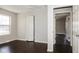 Bedroom featuring natural light, fresh paint, and hardwood flooring at 5060 Staughton Dr, Indianapolis, IN 46226