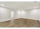 Expansive basement area featuring wood flooring and ample space for versatile living at 5469 Harness Dr, Greenwood, IN 46143