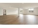 Spacious unfinished basement area with wood-look floors and bright, natural light at 5469 Harness Dr, Greenwood, IN 46143