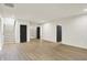 Open basement featuring wood floors, neutral walls and recessed lighting, providing a clean and versatile space at 5469 Harness Dr, Greenwood, IN 46143
