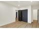 Bedroom featuring a large closet, wood-look floors, and a ceiling fan at 5469 Harness Dr, Greenwood, IN 46143