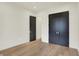 Open bedroom features hardwood floors and dual closets at 5469 Harness Dr, Greenwood, IN 46143