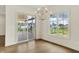 Dining area featuring sliding door access to the deck and neighborhood views at 5469 Harness Dr, Greenwood, IN 46143