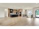 Open-concept living area featuring a modern kitchen and adjacent dining space at 5469 Harness Dr, Greenwood, IN 46143