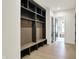Hallway with mudroom area, featuring a storage bench at 5469 Harness Dr, Greenwood, IN 46143