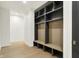 Mudroom area features storage bench and lots of space at 5469 Harness Dr, Greenwood, IN 46143