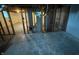 Unfinished basement area with furnace, water heater, and exposed pipes at 5625 Gateway Dr, Indianapolis, IN 46254