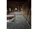 View of an unfinished space with exposed framing, perfect for custom design and remodeling at 5625 Gateway Dr, Indianapolis, IN 46254