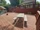 Expansive deck with seating and picnic area, plus storage shed for enjoying the outdoors at 620 Valley Dr, Martinsville, IN 46151