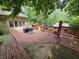 Expansive deck with multiple seating areas and lush green surroundings, providing a serene outdoor retreat at 620 Valley Dr, Martinsville, IN 46151