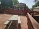 Multi-level deck with ample space for outdoor dining and relaxing, surrounded by greenery at 620 Valley Dr, Martinsville, IN 46151