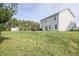 A large backyard features trees and a storage shed at 975 Red Hills Ct, Lebanon, IN 46052