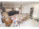 Open basement area featuring a large table and a comfortable seating area at 975 Red Hills Ct, Lebanon, IN 46052