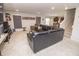 Open basement area with a large sectional sofa and recessed lighting at 975 Red Hills Ct, Lebanon, IN 46052