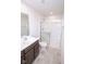 Bathroom featuring a shower with glass doors and modern fixtures at 975 Red Hills Ct, Lebanon, IN 46052