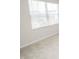 This is a bedroom with a large window and new carpeting at 975 Red Hills Ct, Lebanon, IN 46052